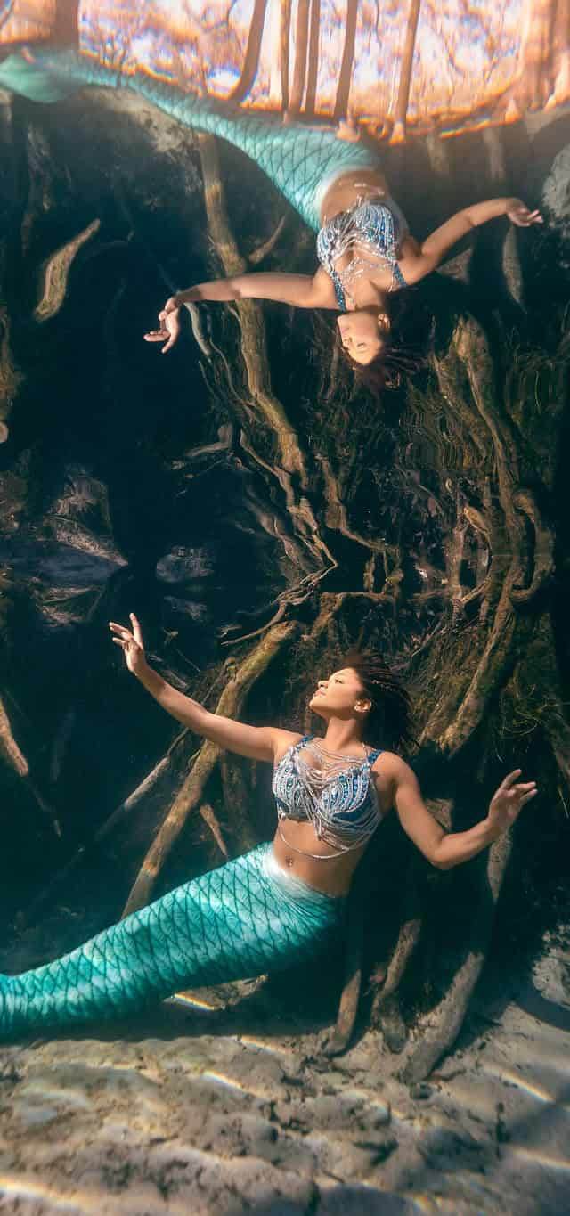 Mermaid sitting on sandy bottom at Ginnie Springs