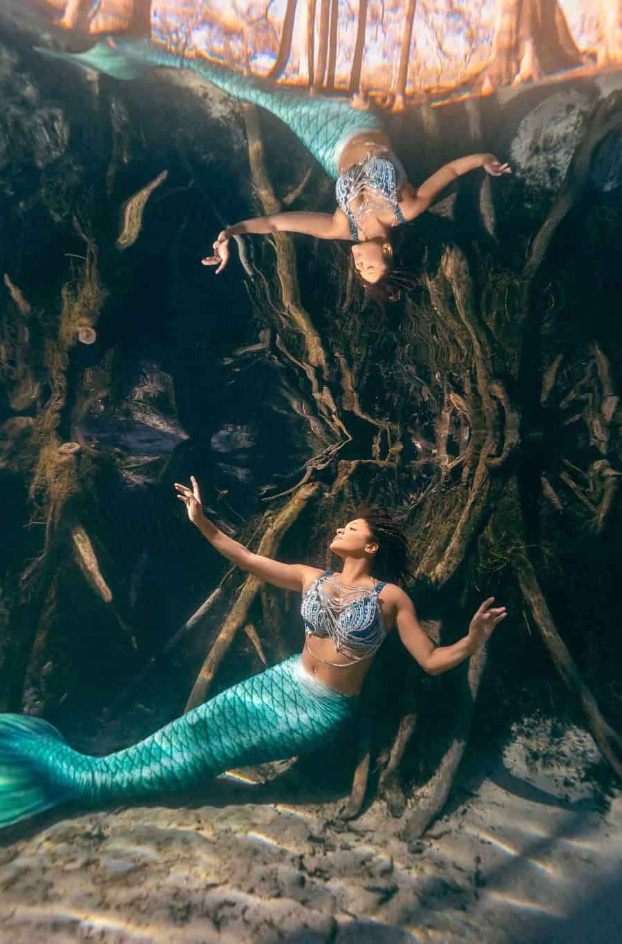 Mermaid sitting on sandy bottom at Ginnie Springs