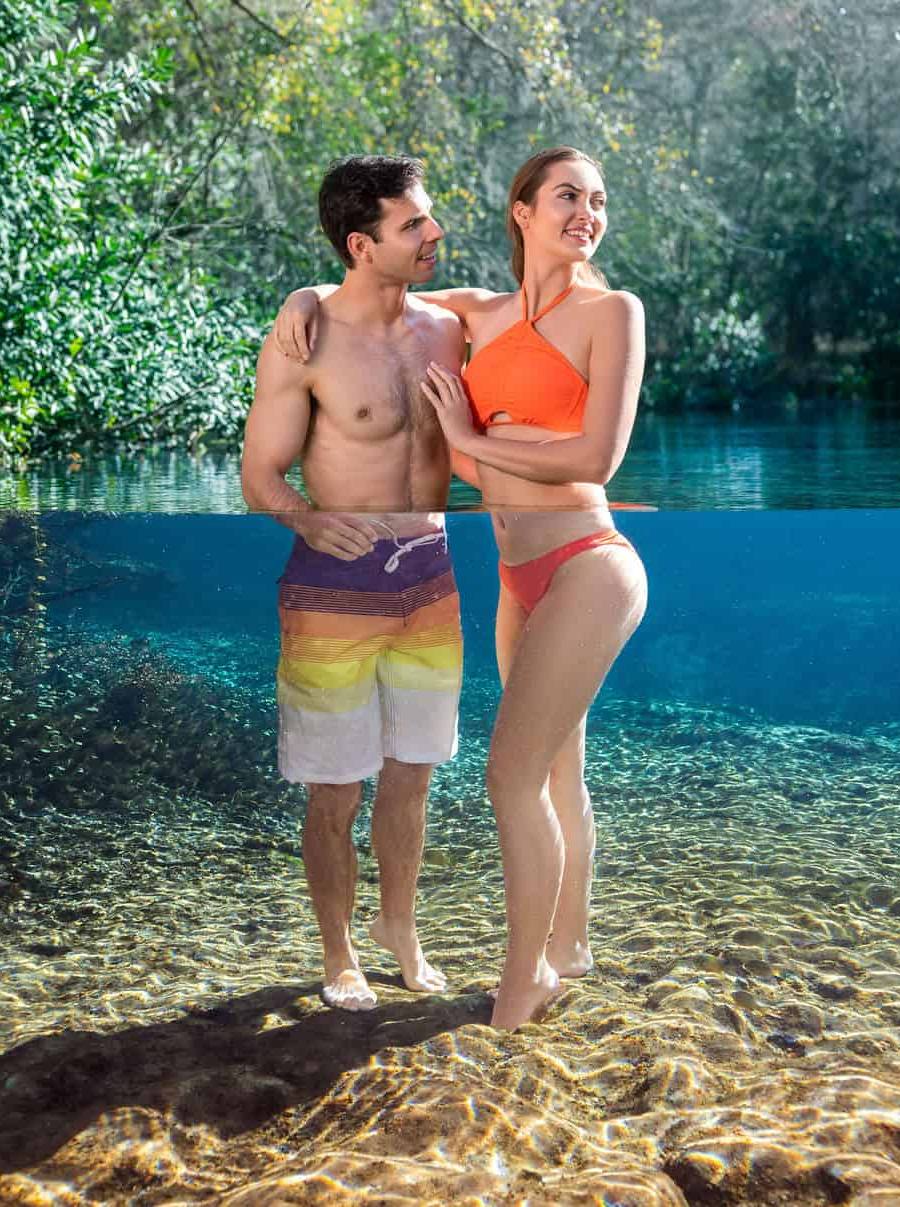A couple stands in the water at Ichetucknee Springs State Park.