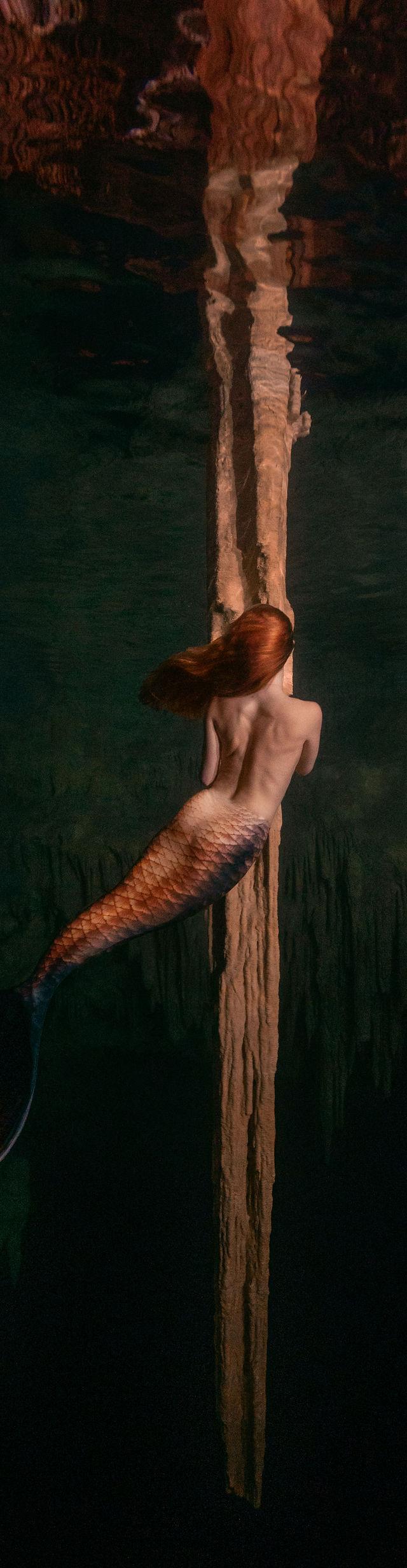 Underwater portrait with flowing fabric