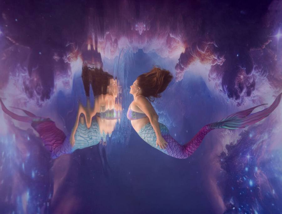 Mermaid poses underwater during modeling workshop