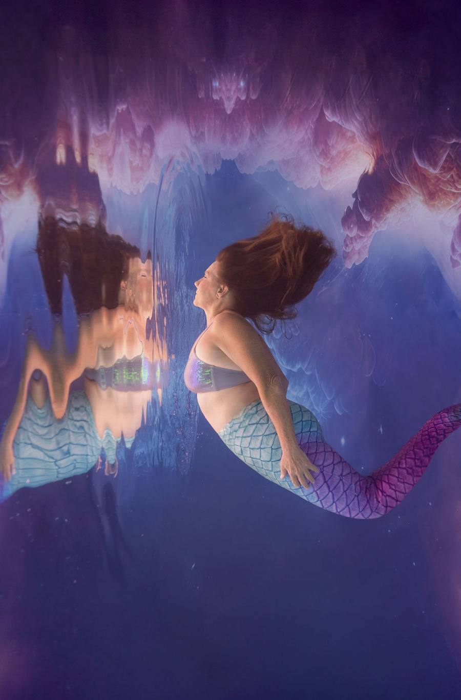 Mermaid poses underwater during modeling workshop