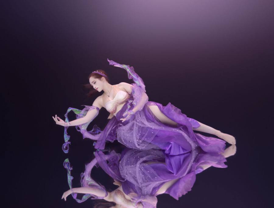 Underwater models in purple